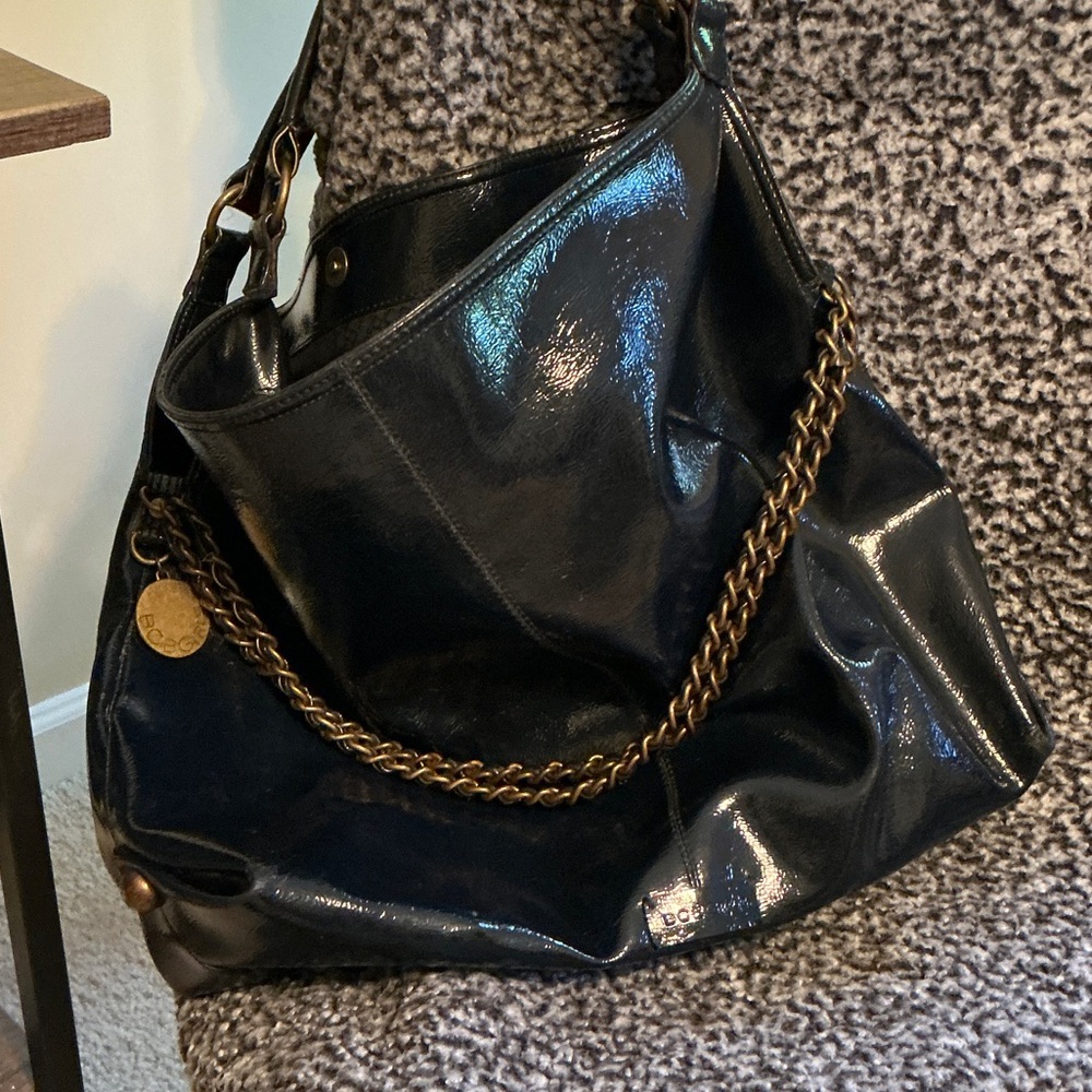 BCBGirls Glossy Black Hobo Bag with Bronze Chain